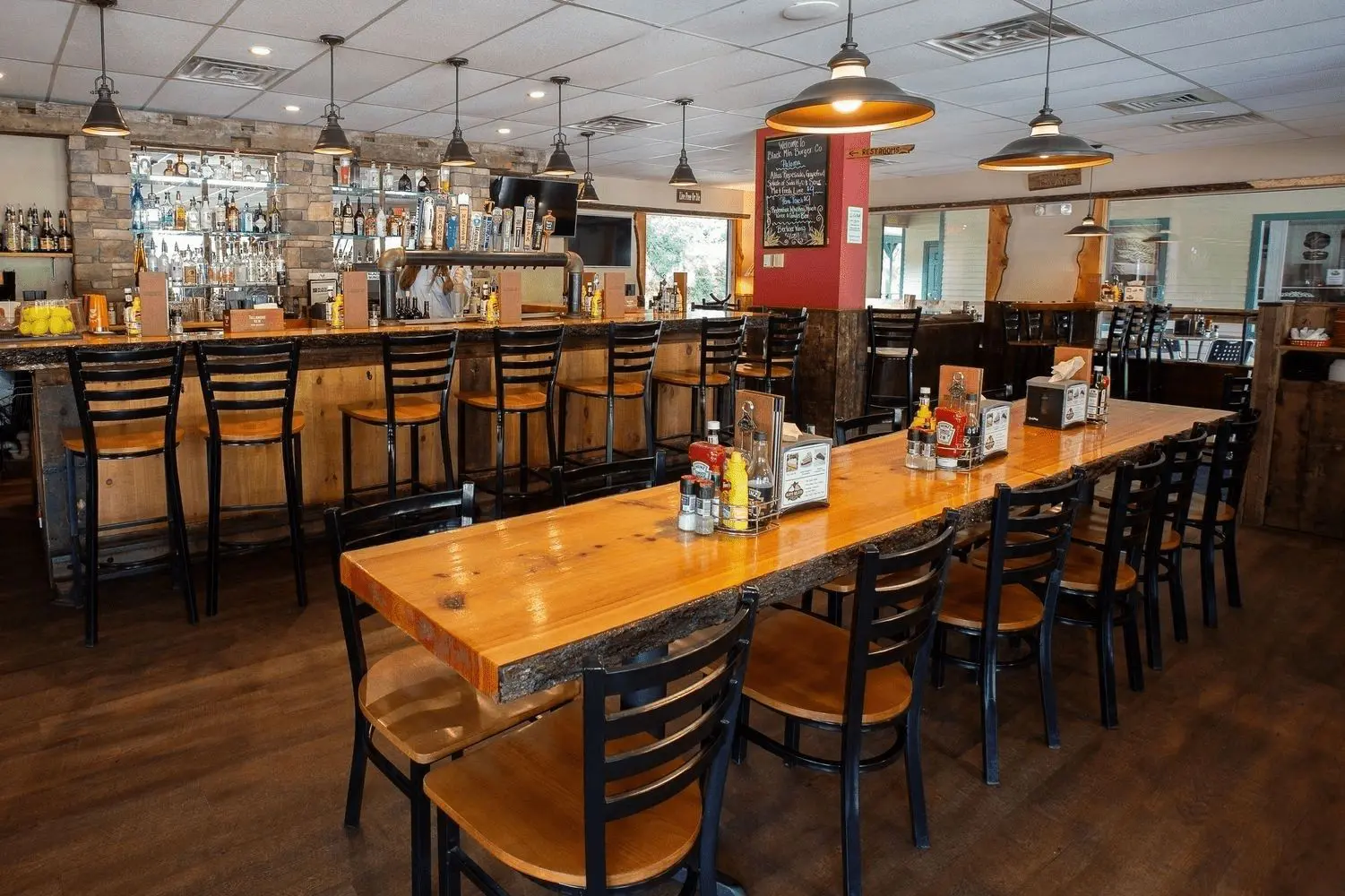 A restaurant with tables and chairs in it